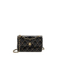 Chanel Vintage quilted flap bag lambskin black with white stitching