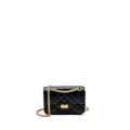 Chanel Mini 2.55 reissue flap bag aged calfskin black