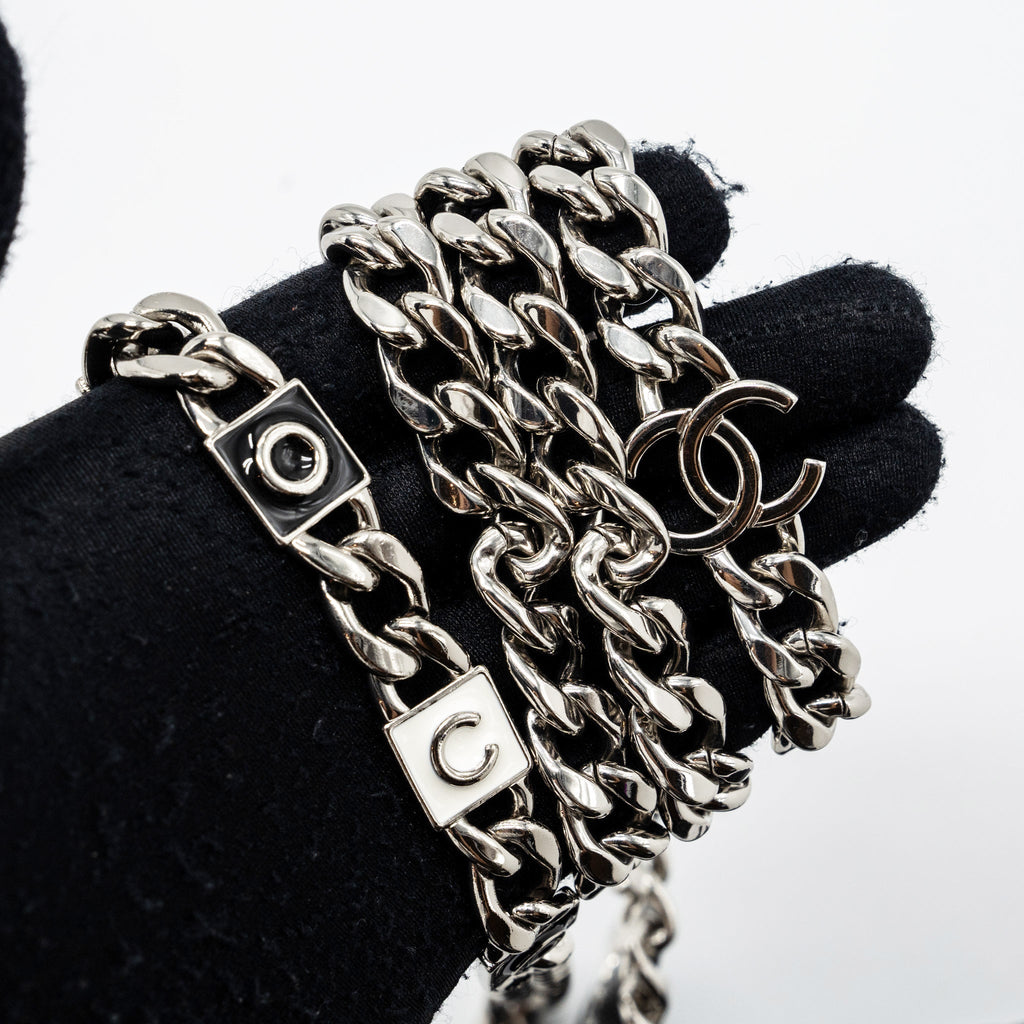 CHANEL MINI FLAP BAG WITH Coco Enamel CHAIN CAVIAR BLACK