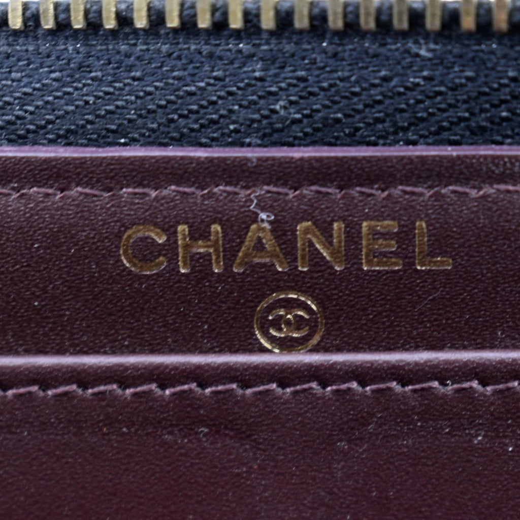 CHANEL Zip Around Quilted Caviar Leather Wallet Black