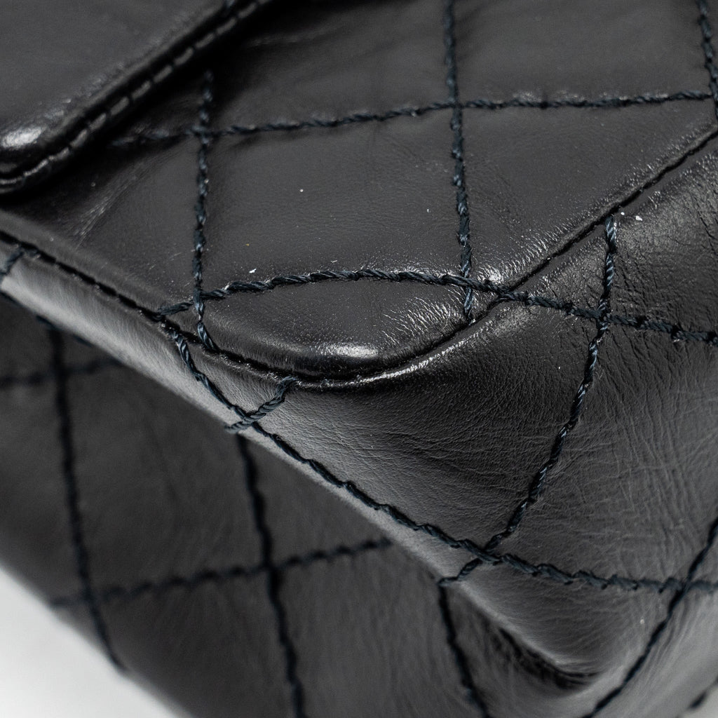 Chanel Mini 2.55 reissue flap bag aged calfskin black