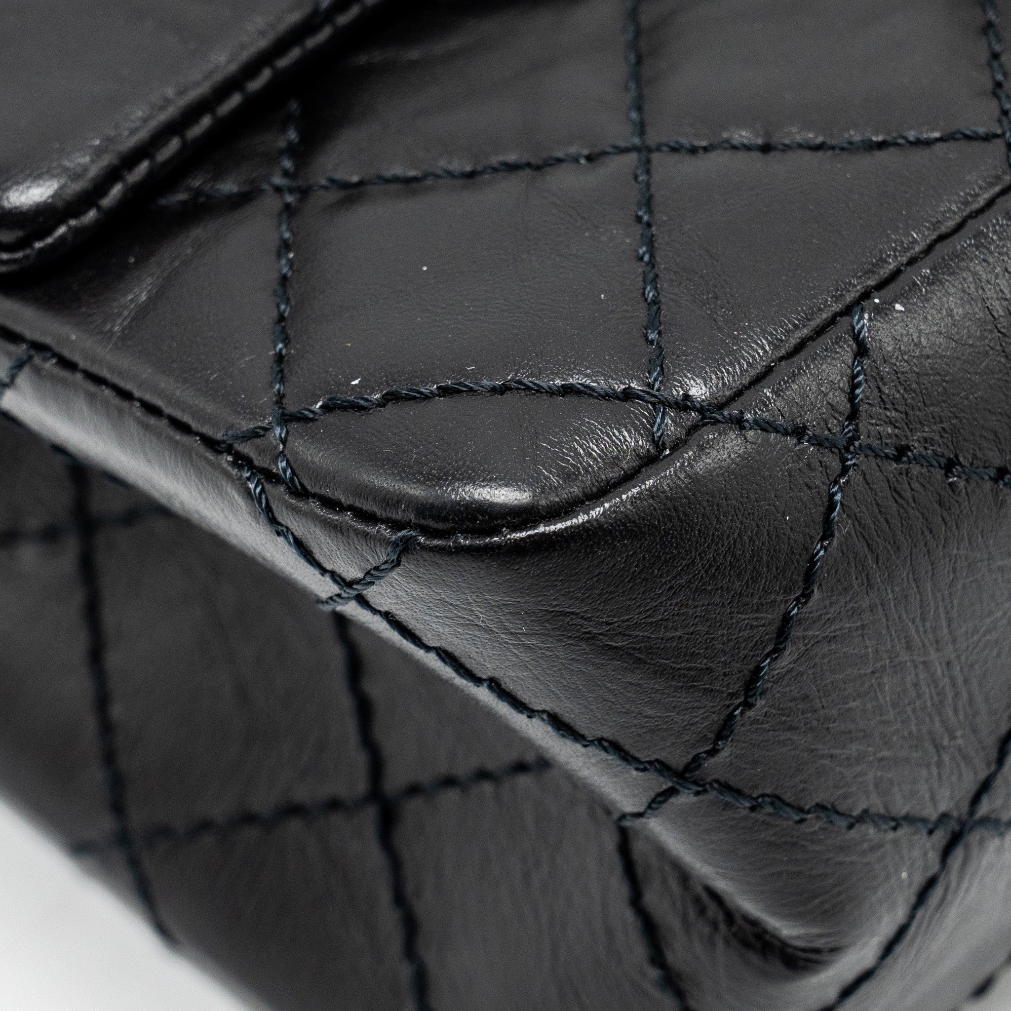 Chanel Mini 2.55 reissue flap bag aged calfskin black