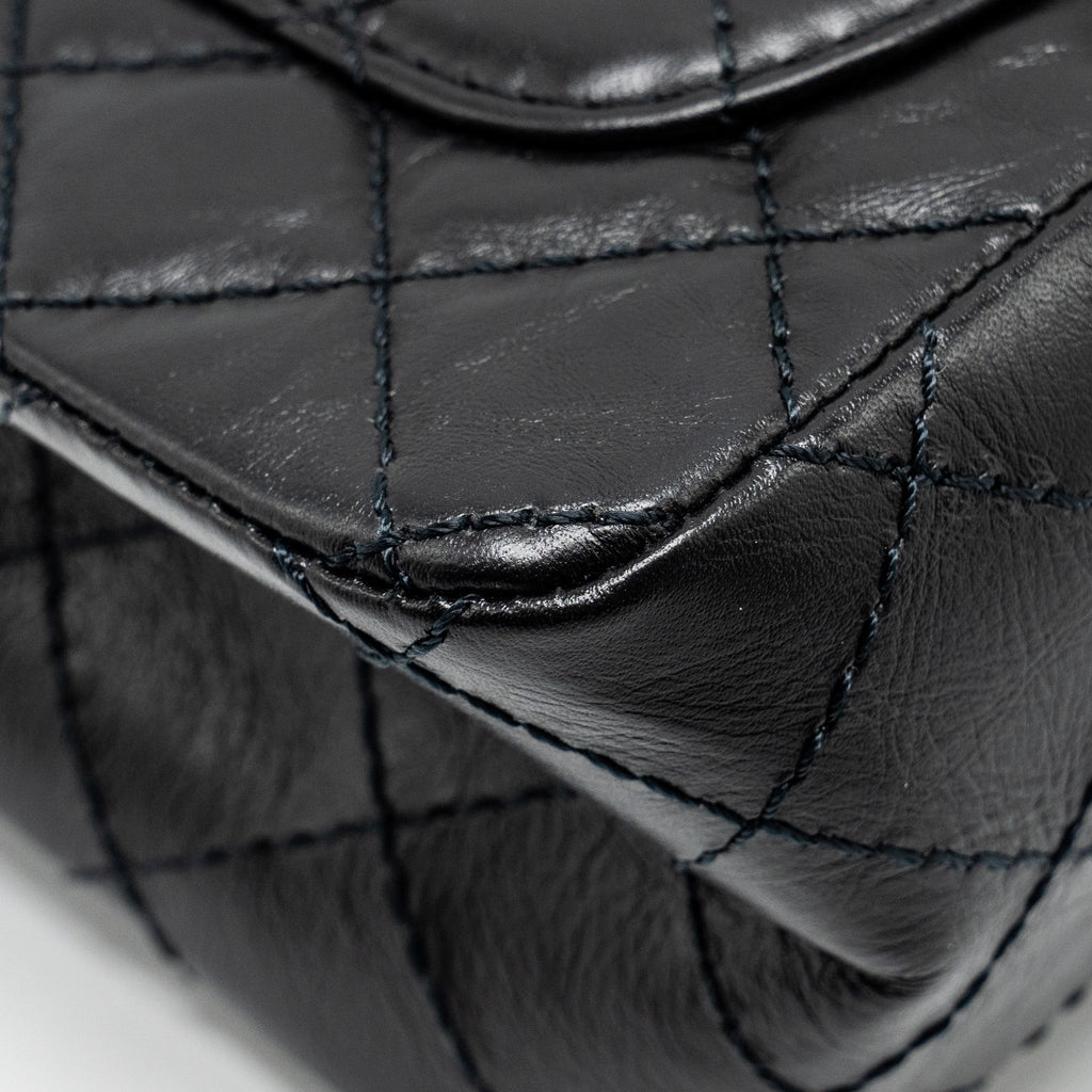 Chanel Mini 2.55 reissue flap bag aged calfskin black