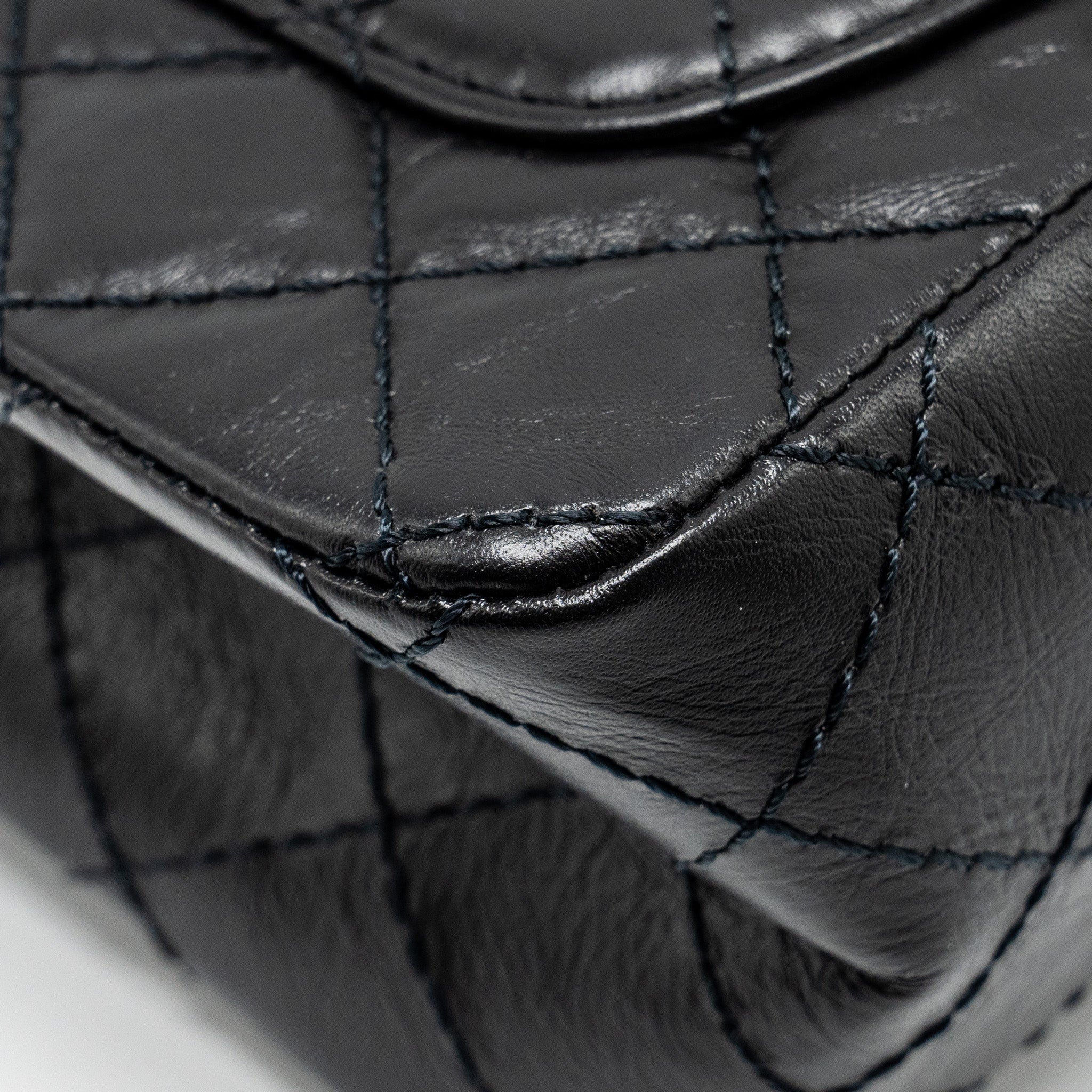 Chanel Mini 2.55 reissue flap bag aged calfskin black