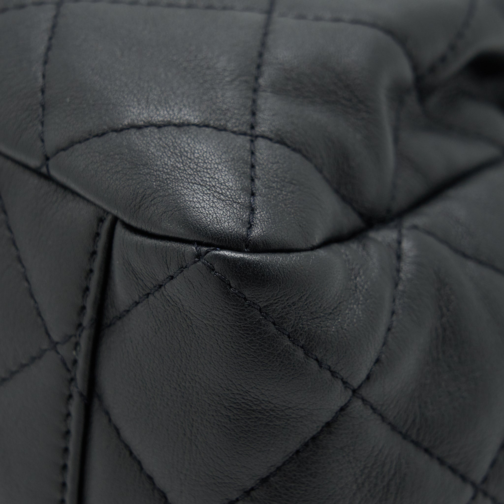Chanel bucket bag quilted lambskin black L