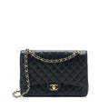 Chanel Maxi Classic Double Flap Bag Caviar Black