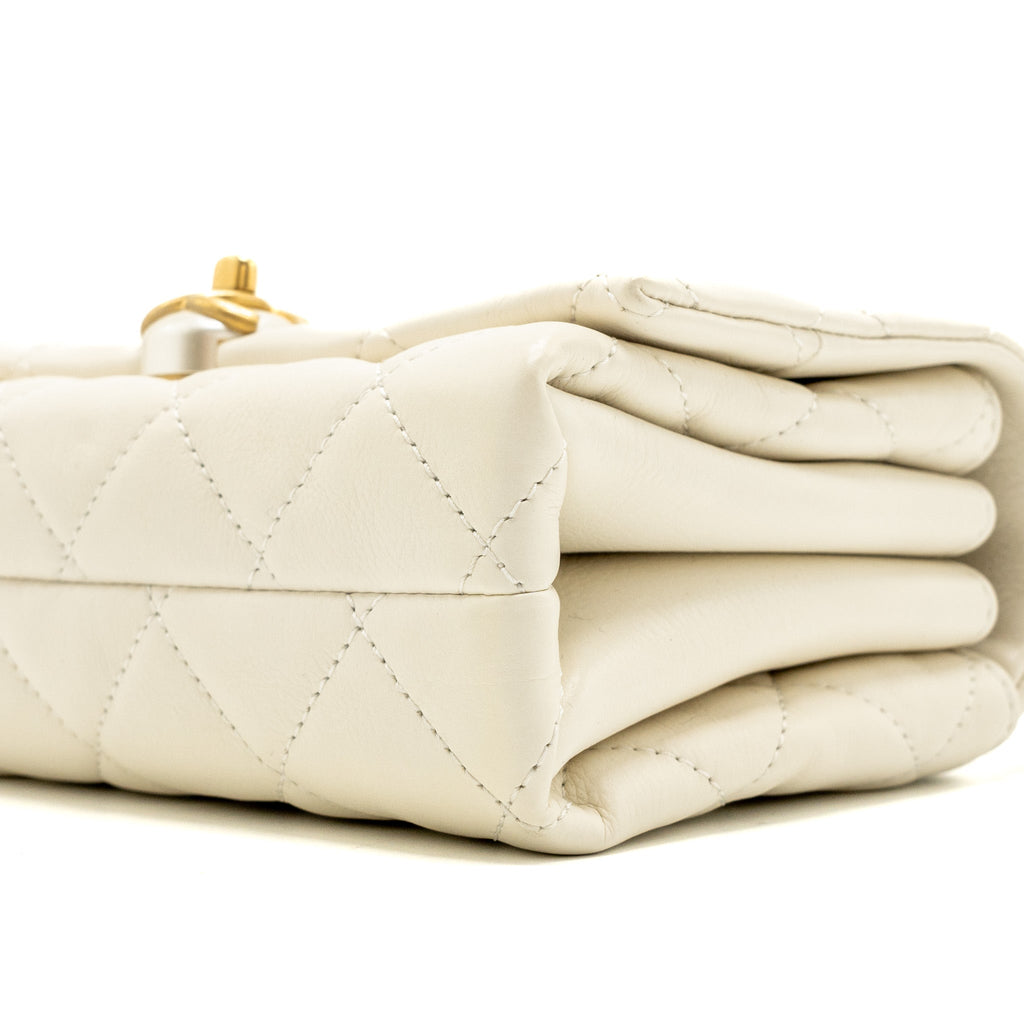 Chanel quilted mini flap bag Calfskin white