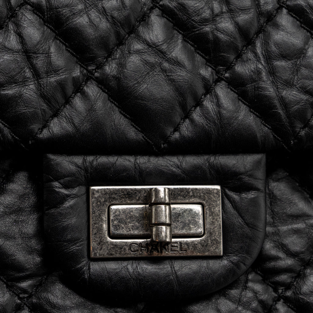 Chanel small 2.55 reissue flap bag aged calfskin black ruthenium