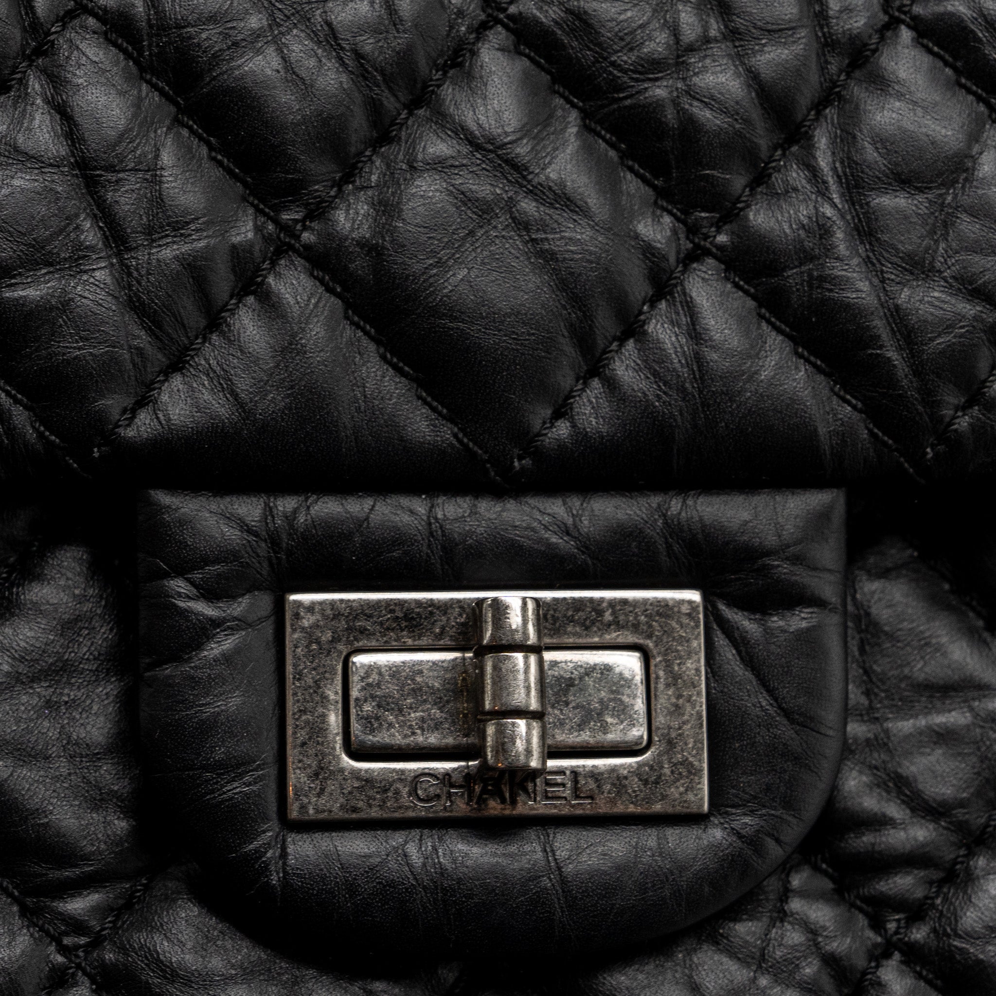 Chanel small 2.55 reissue flap bag aged calfskin black ruthenium