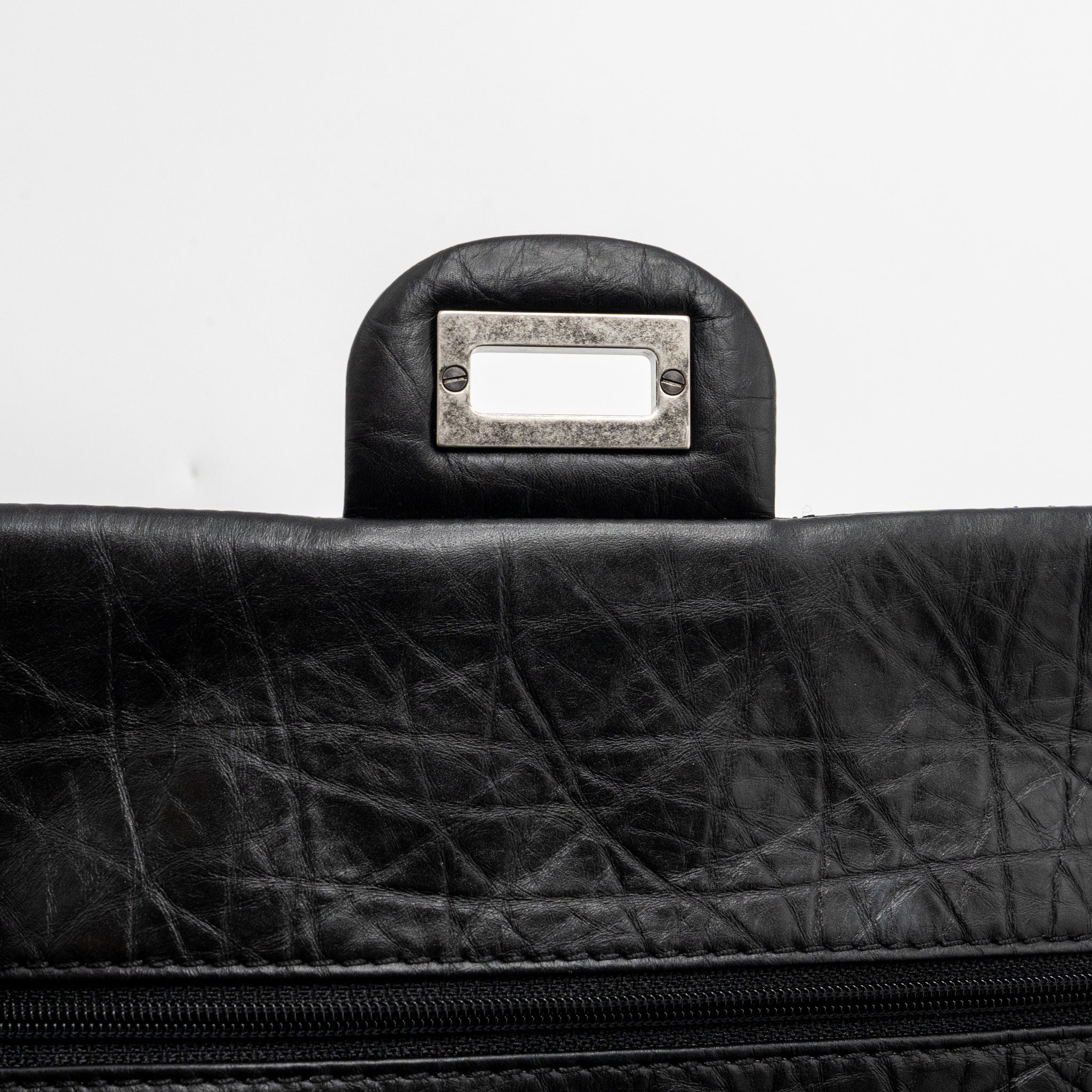 Chanel small 2.55 reissue flap bag aged calfskin black ruthenium