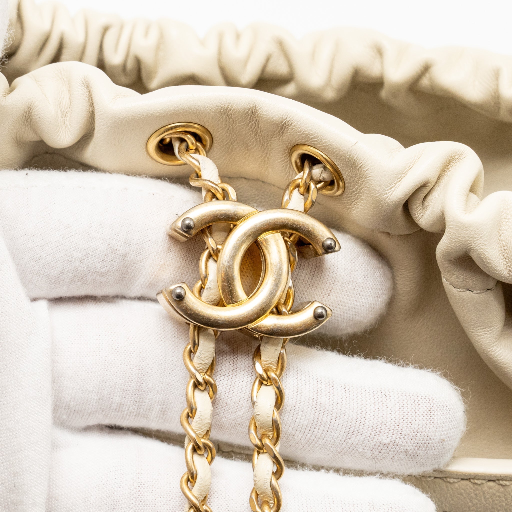 Chanel bucket bag lambskin creamy white