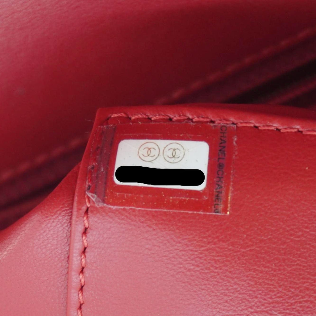 CHANEL CC Filigree Medium Flap Caviar Leather Crossbody Bag Red