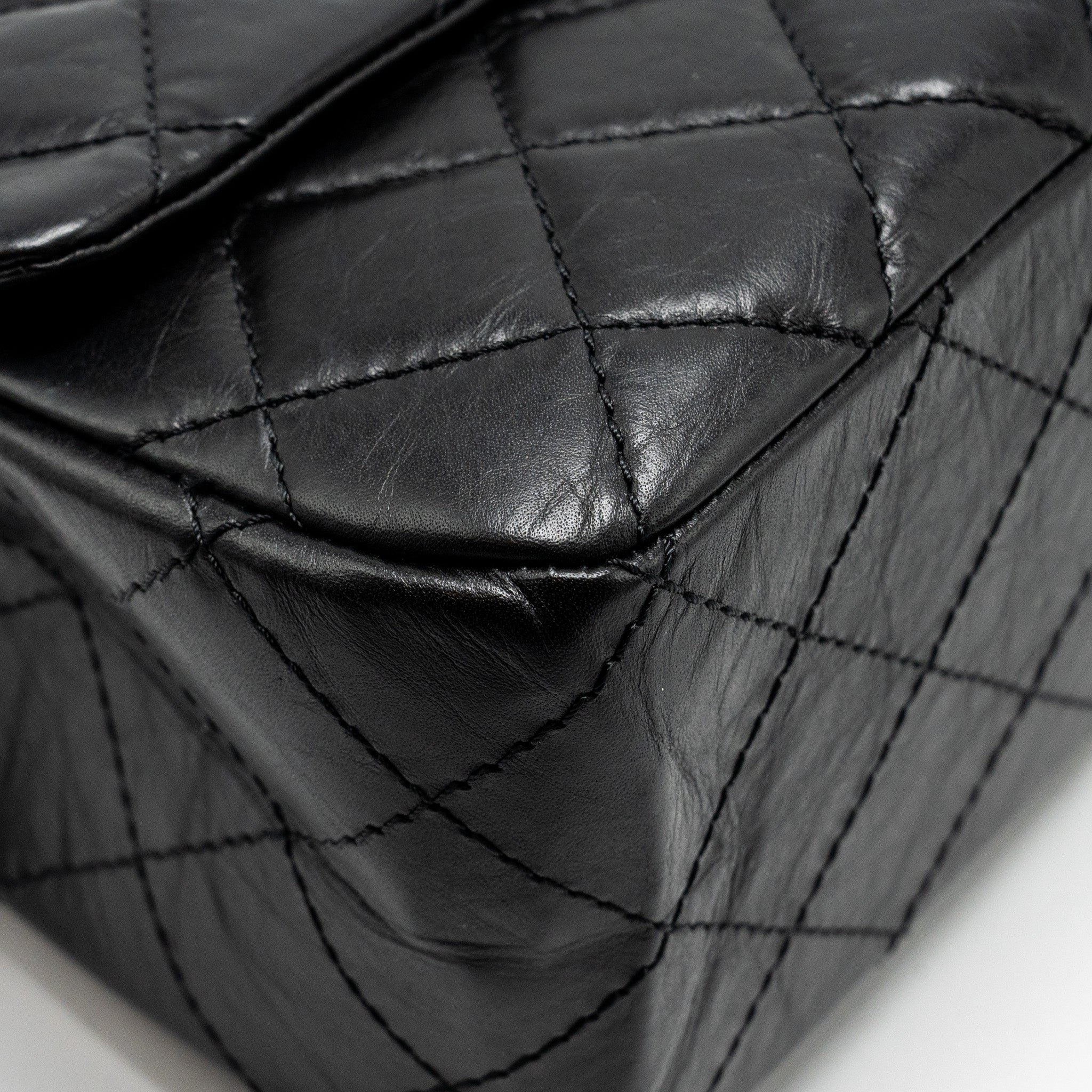 Chanel Maxi 2.55 reissue flap bag aged calfskin Black