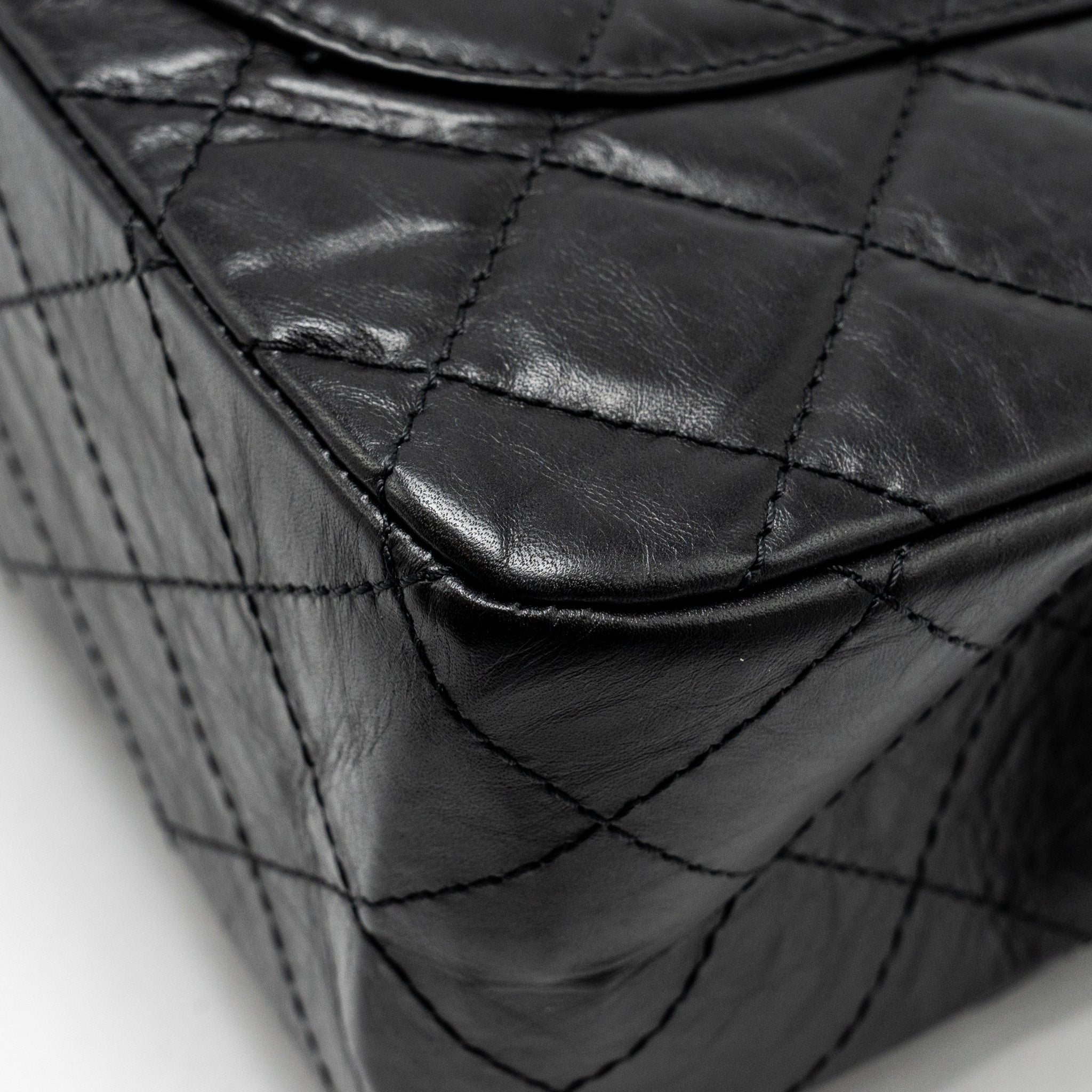 Chanel Maxi 2.55 reissue flap bag aged calfskin Black
