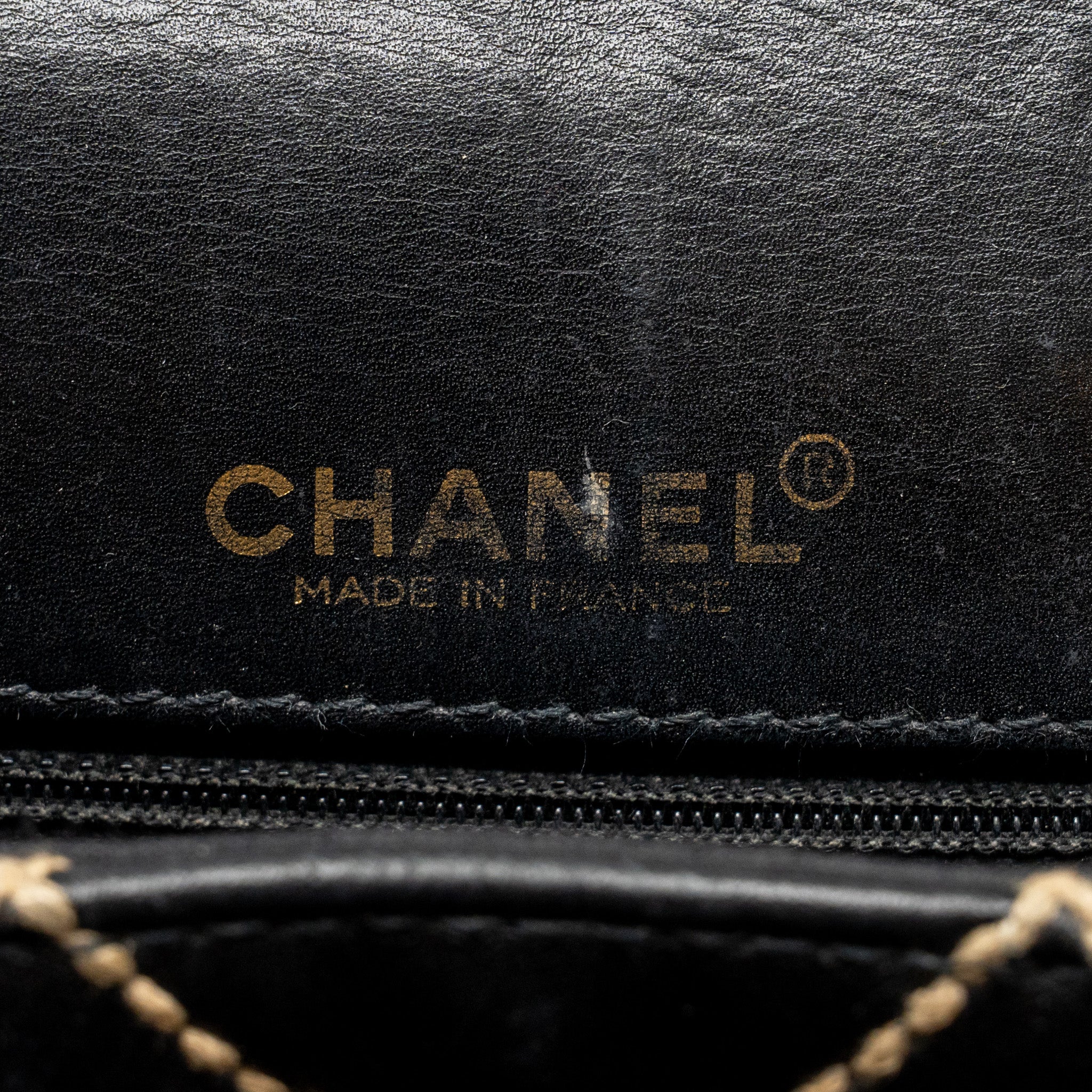 Chanel Vintage quilted flap bag lambskin black with white stitching