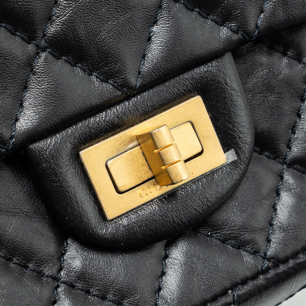 Chanel Mini 2.55 reissue flap bag aged calfskin black