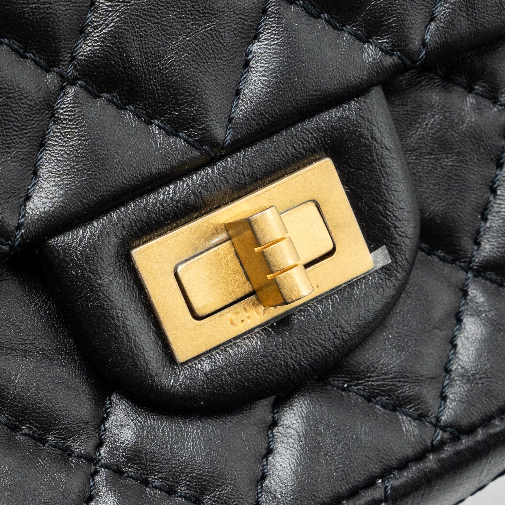 Chanel Mini 2.55 reissue flap bag aged calfskin black