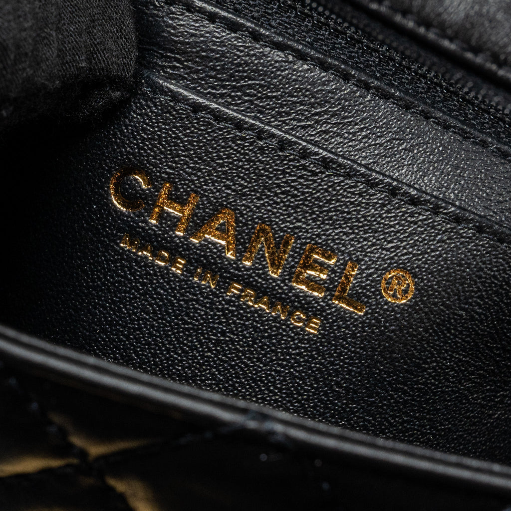 Chanel Mini 2.55 reissue flap bag aged calfskin black