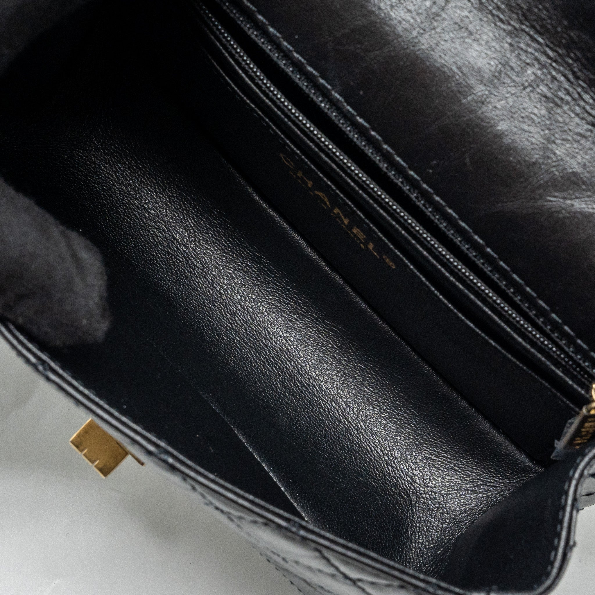 Chanel Mini 2.55 reissue flap bag aged calfskin black