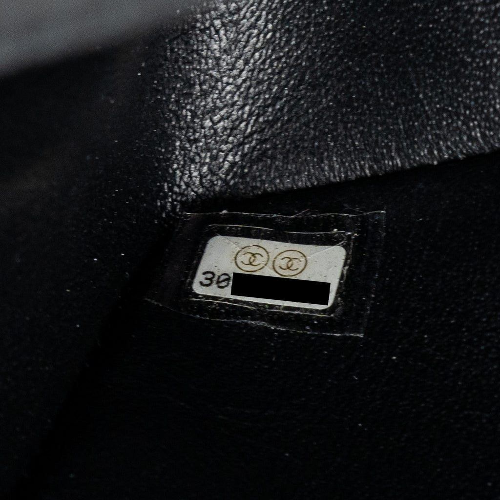 Chanel Mini 2.55 reissue flap bag aged calfskin black