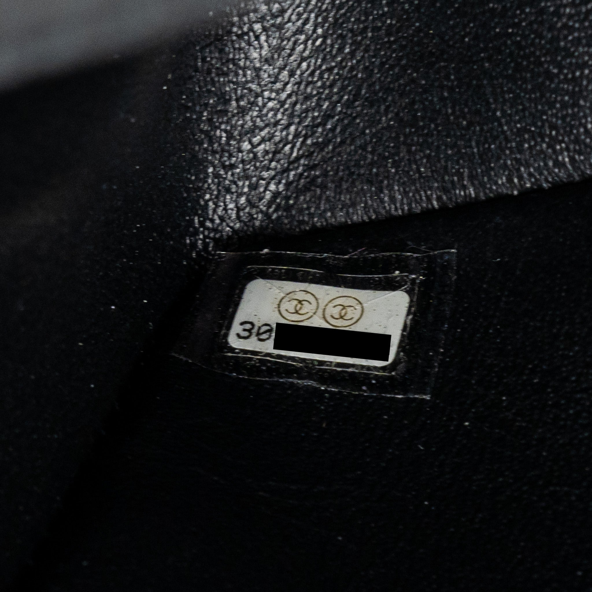 Chanel Mini 2.55 reissue flap bag aged calfskin black