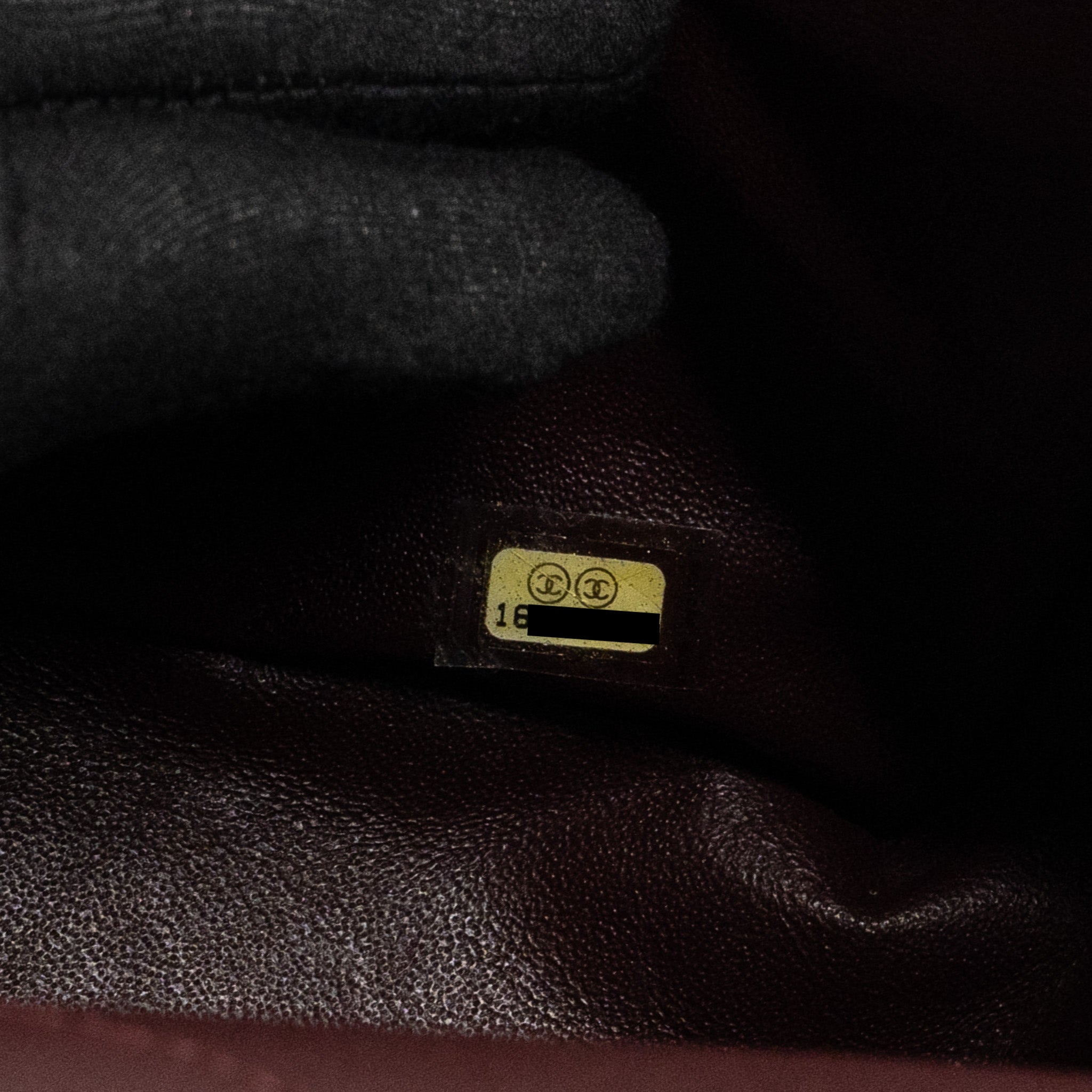 Chanel Maxi 2.55 reissue flap bag aged calfskin Black