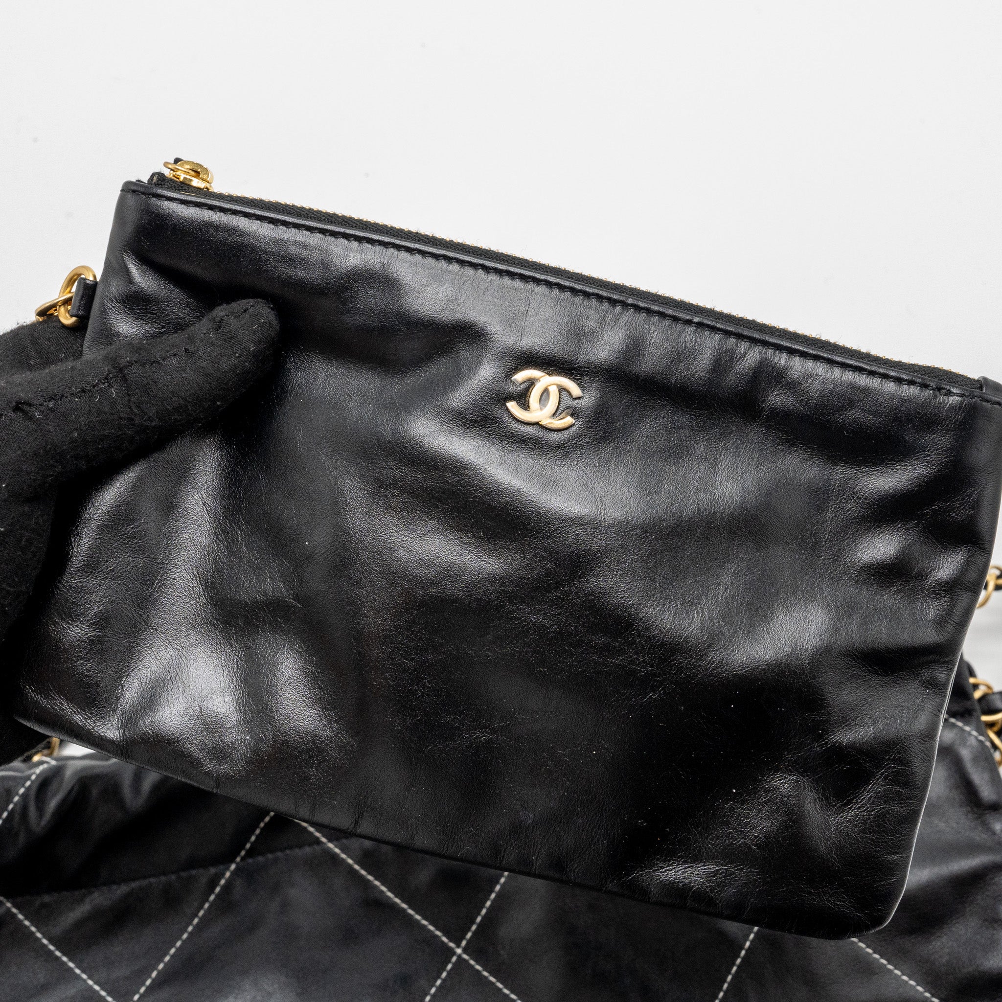 Chanel small 22 bag calfskin with white Stitching black  (microchip)