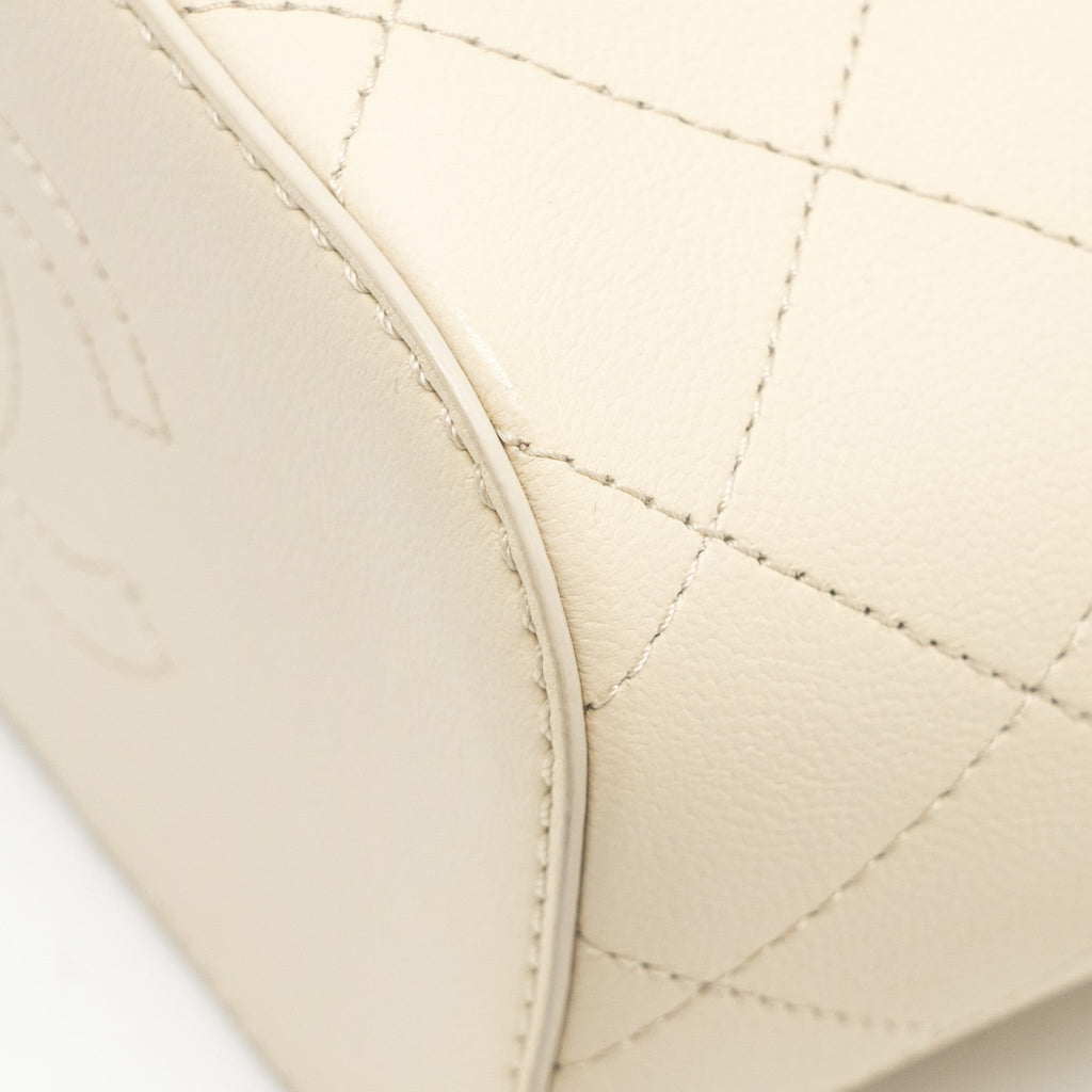 Chanel bucket bag lambskin creamy white