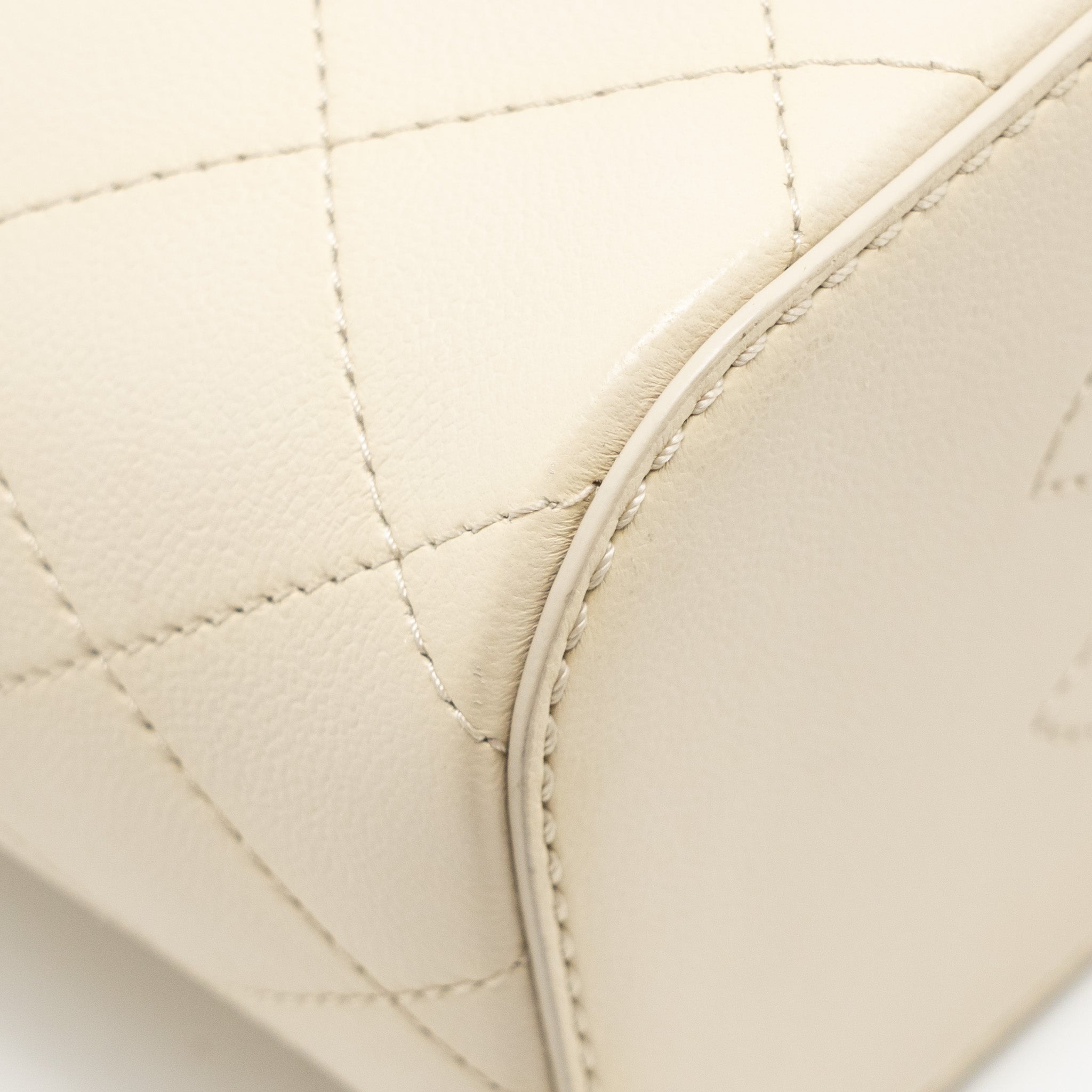 Chanel bucket bag lambskin creamy white