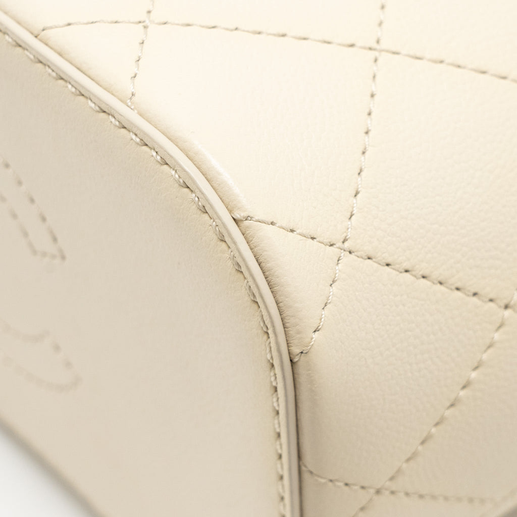 Chanel bucket bag lambskin creamy white