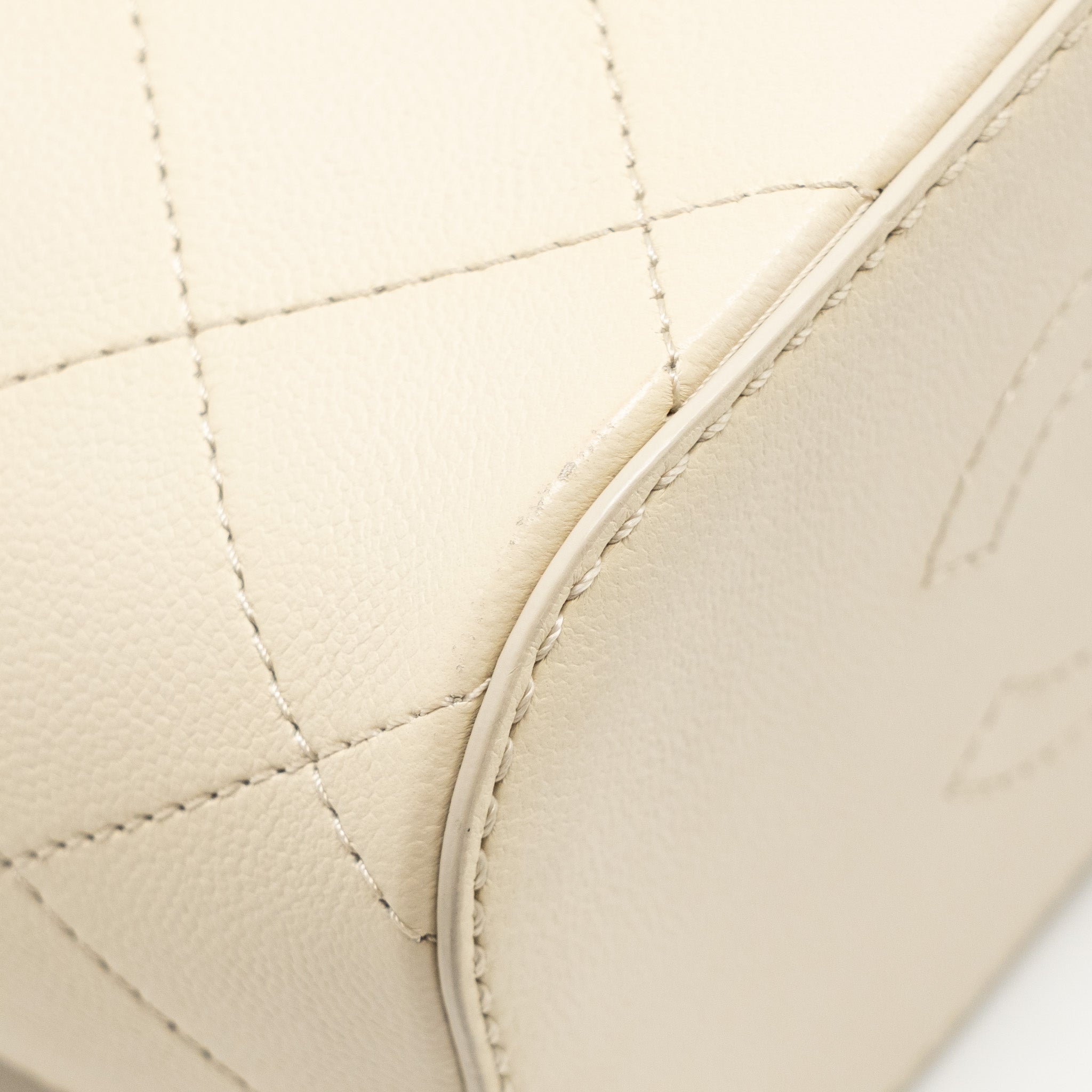 Chanel bucket bag lambskin creamy white