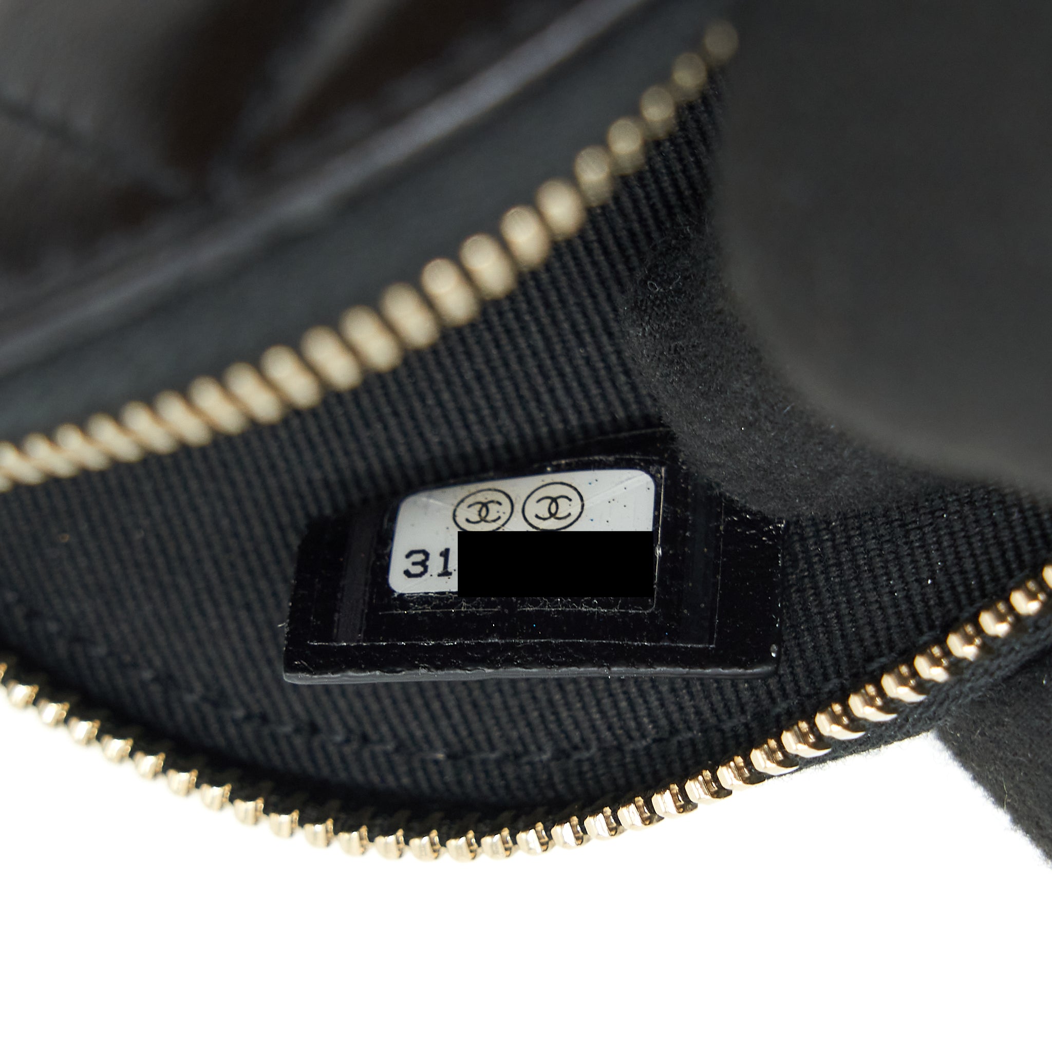 Chanel mini Round Camellia zippy Wallet with Chain Lambskin black