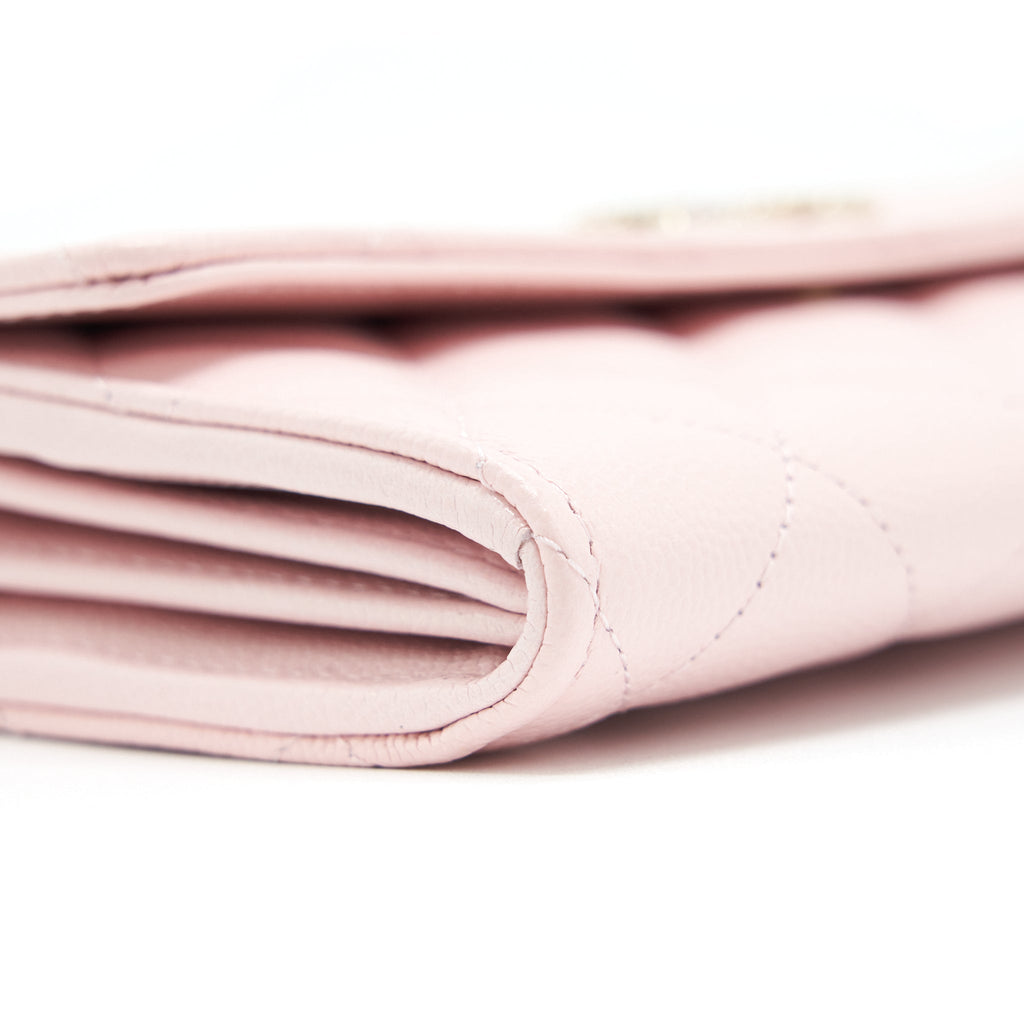 Chanel 22S detailed logo flap long wallet caviar light pink with L