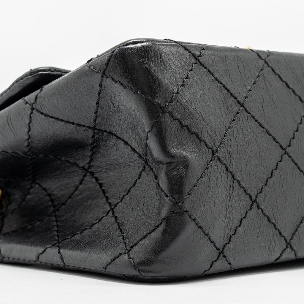 Chanel mini 2.55 reissue flap bag aged calfskin black