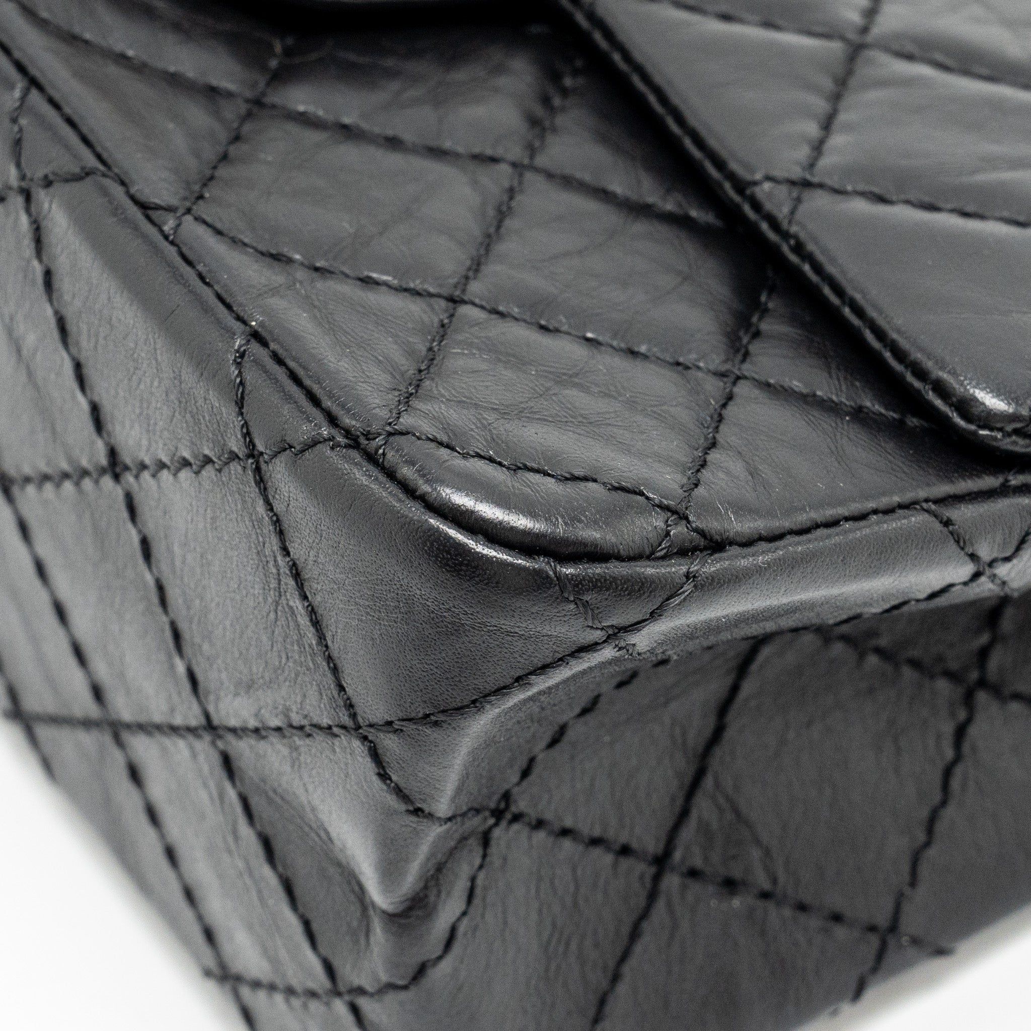 Chanel mini 2.55 reissue flap bag aged calfskin black