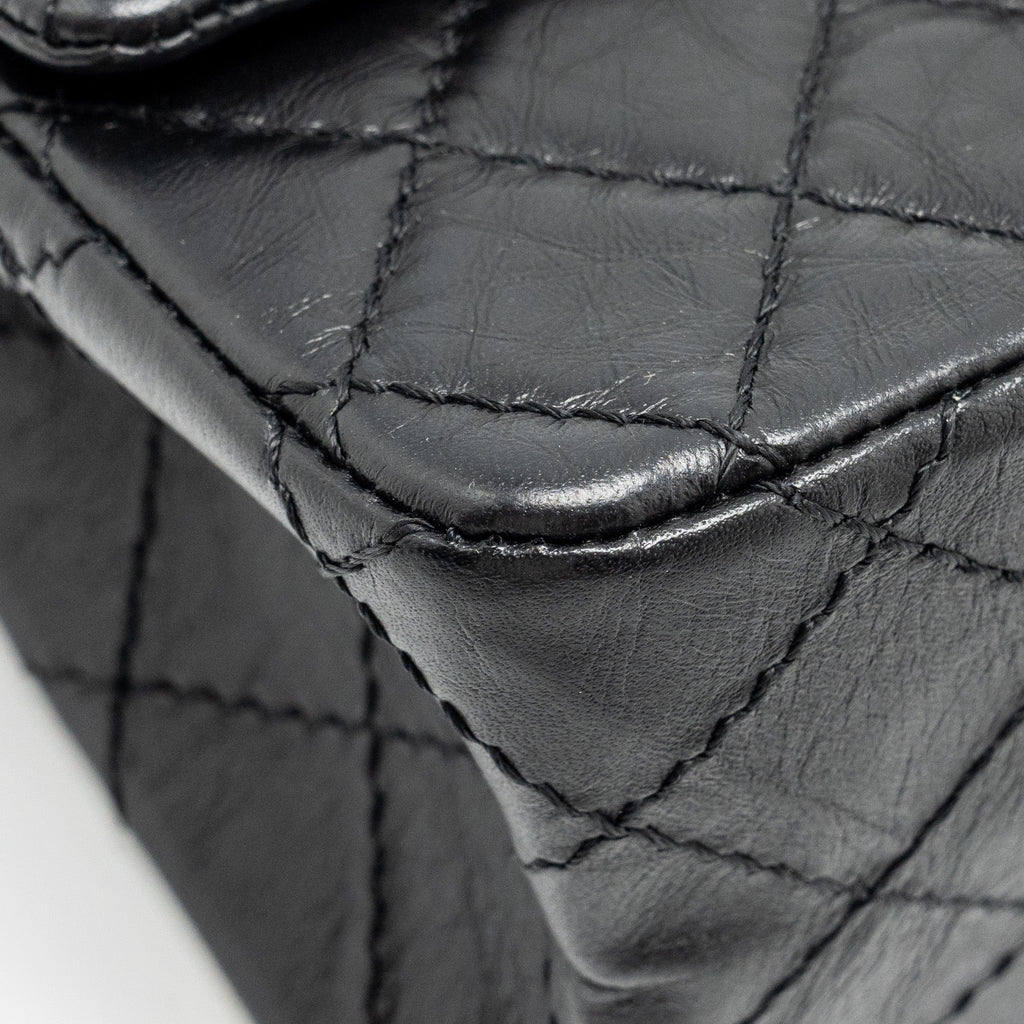 Chanel mini 2.55 reissue flap bag aged calfskin black
