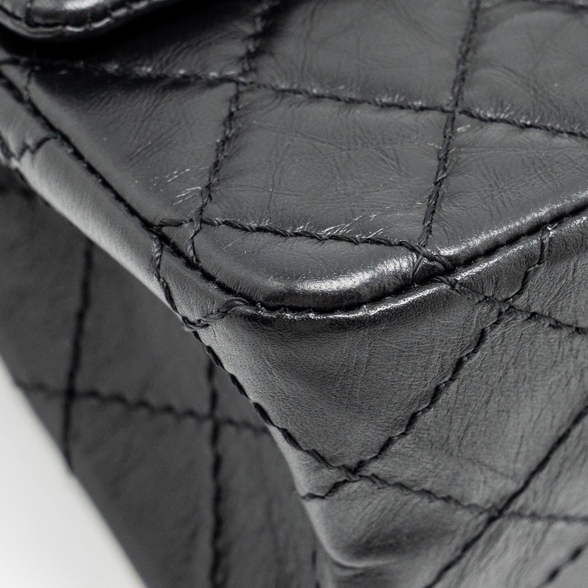 Chanel mini 2.55 reissue flap bag aged calfskin black