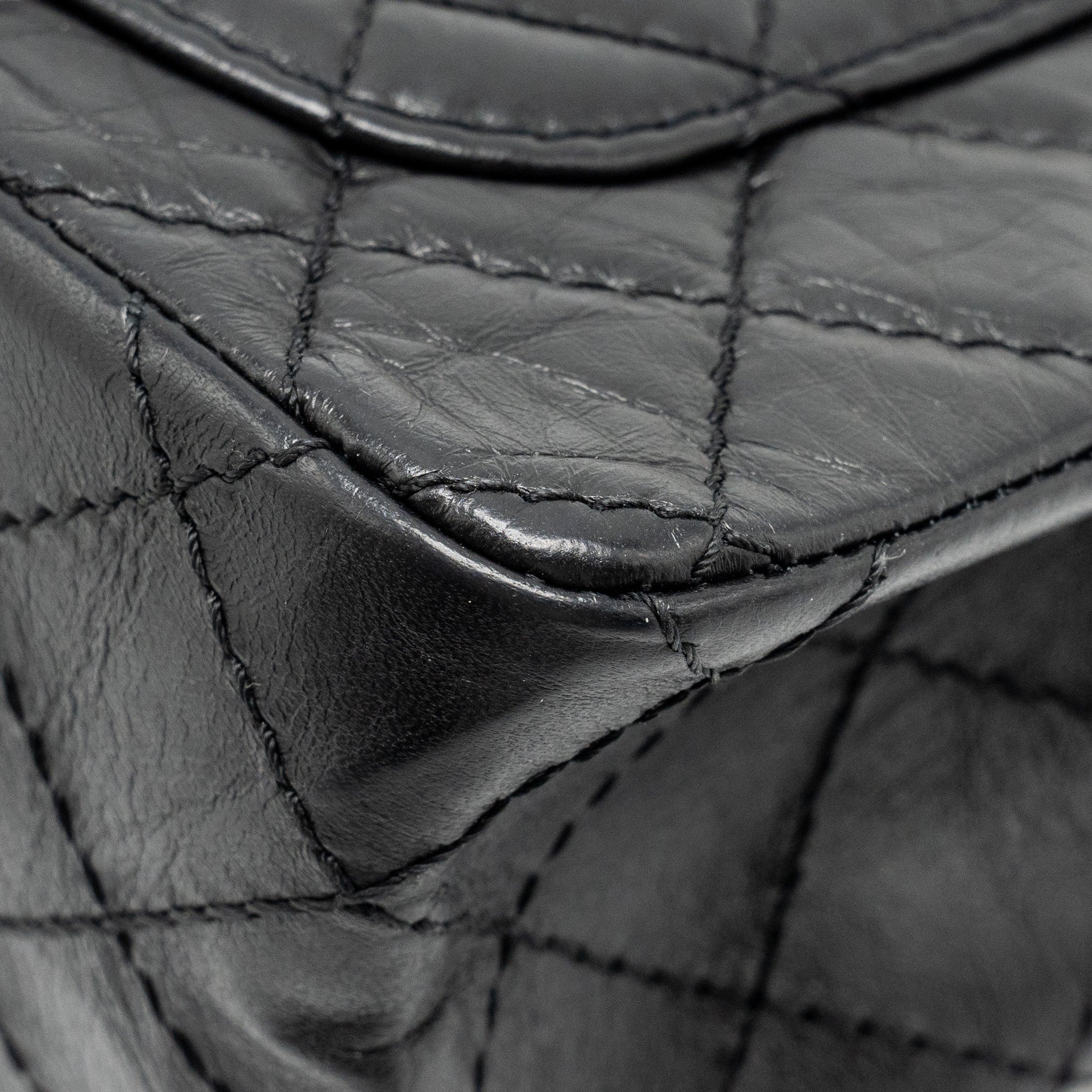 Chanel mini 2.55 reissue flap bag aged calfskin black