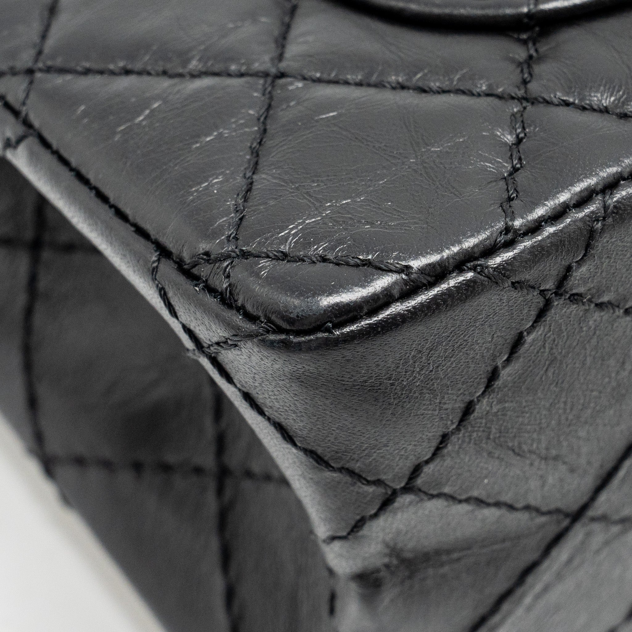 Chanel mini 2.55 reissue flap bag aged calfskin black