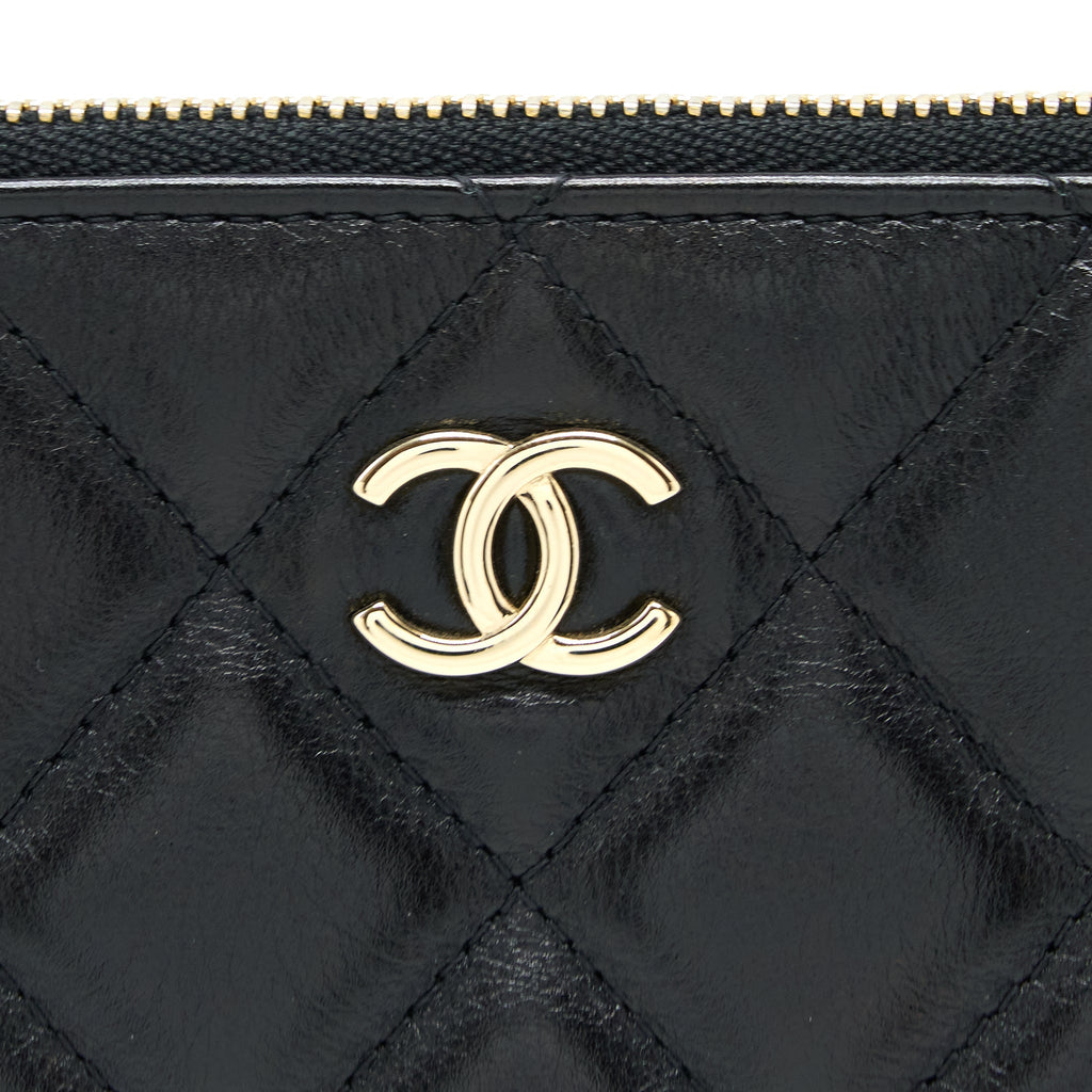 Chanel O-Case Pouch Pearl/Aged Calfskin Black L