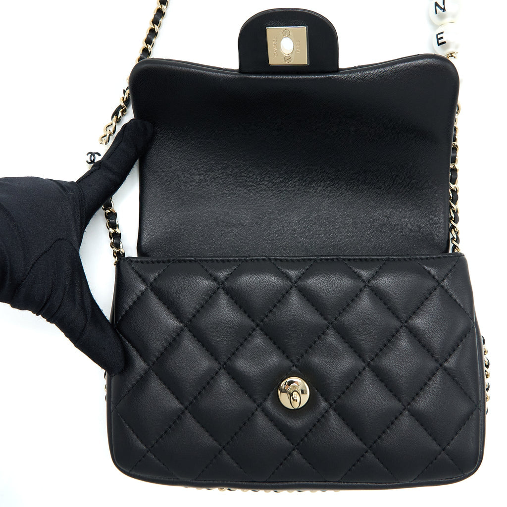 Chanel Small Pearl Logo Strap Flap Bag Lambskin Black L