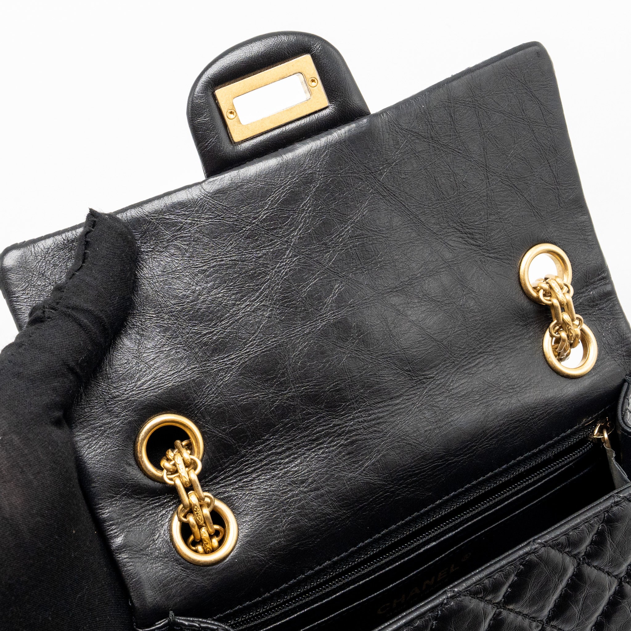 Chanel mini 2.55 reissue flap bag aged calfskin black