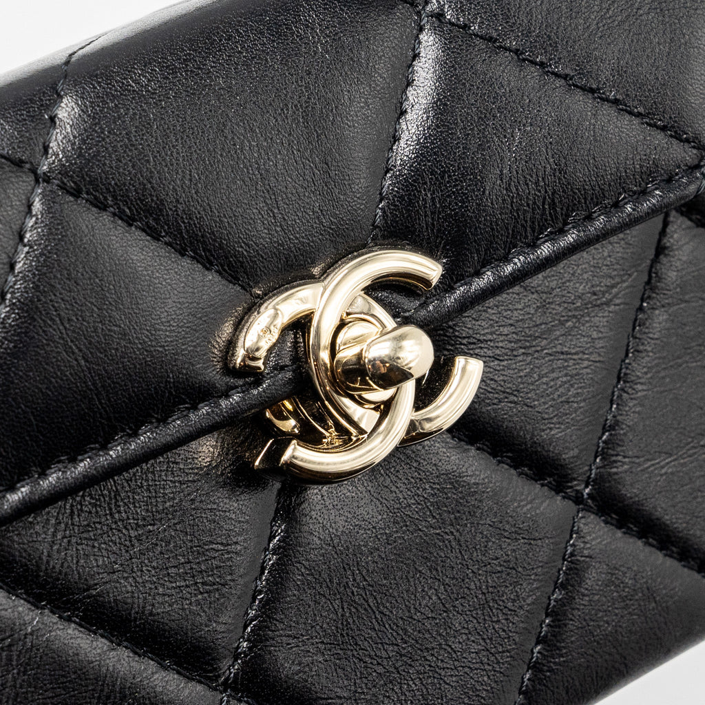 Chanel 23k top handle vanity bag shiny calfskin black  (microchip)