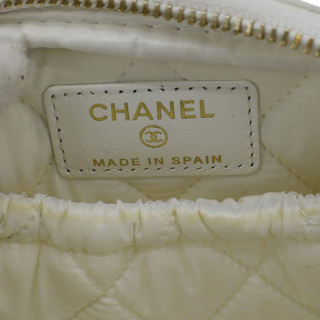 CHANEL Curvy Small Quilted Caviar Leather Cosmetic Pouch White