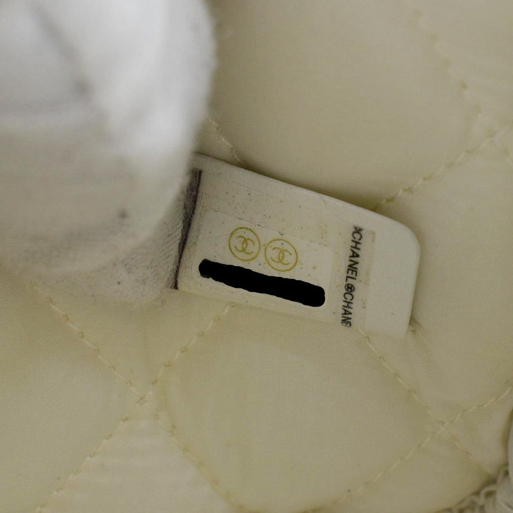 CHANEL Curvy Small Quilted Caviar Leather Cosmetic Pouch White
