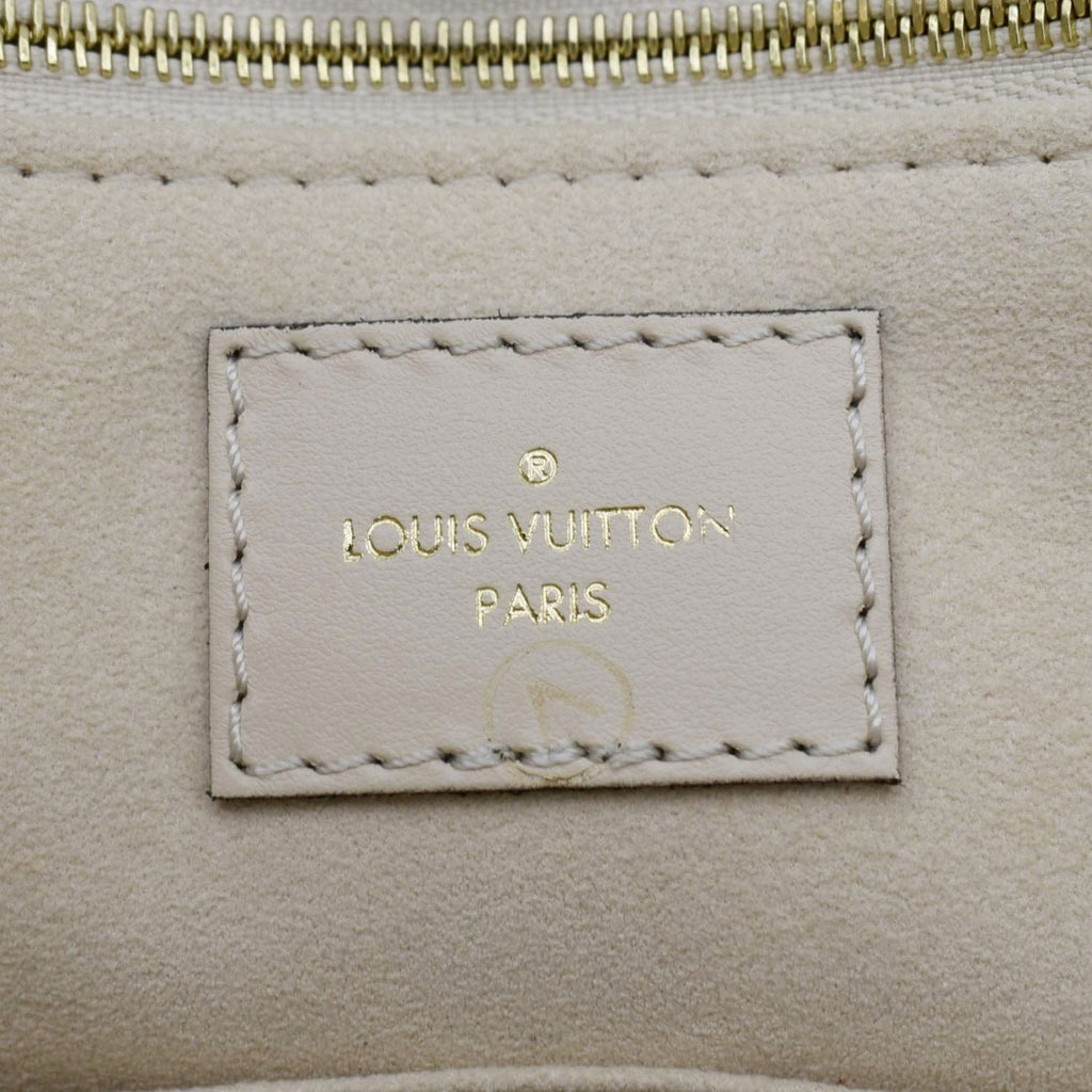 LOUIS VUITTON Onthego MM Monogram Empreinte Leather Tote Bag Cream