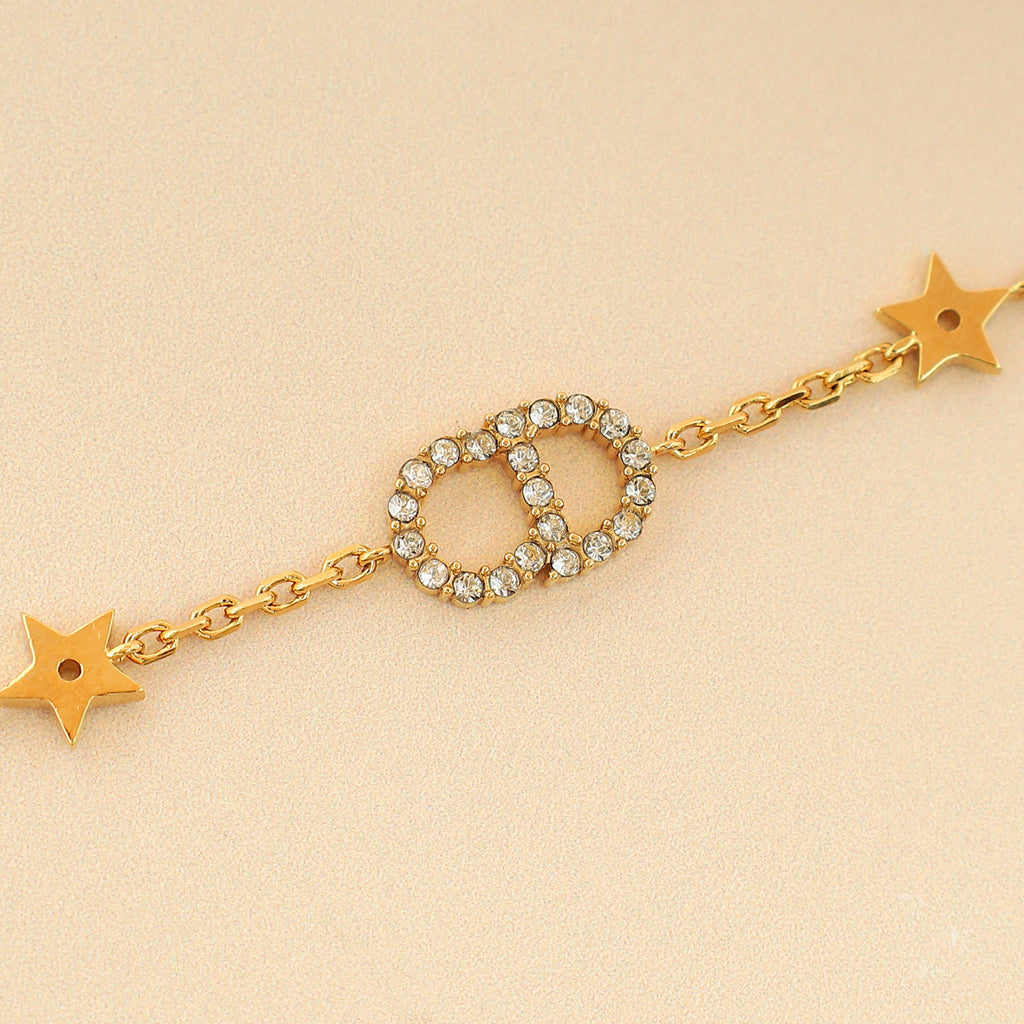 Christian Dior Gold Finish CD & Star Clair D Lune Set  Bracelet