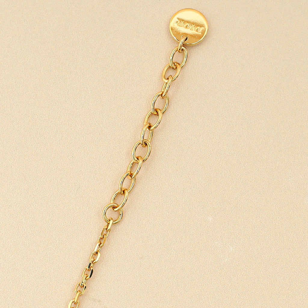 Christian Dior Gold Finish CD & Star Clair D Lune Set  Bracelet
