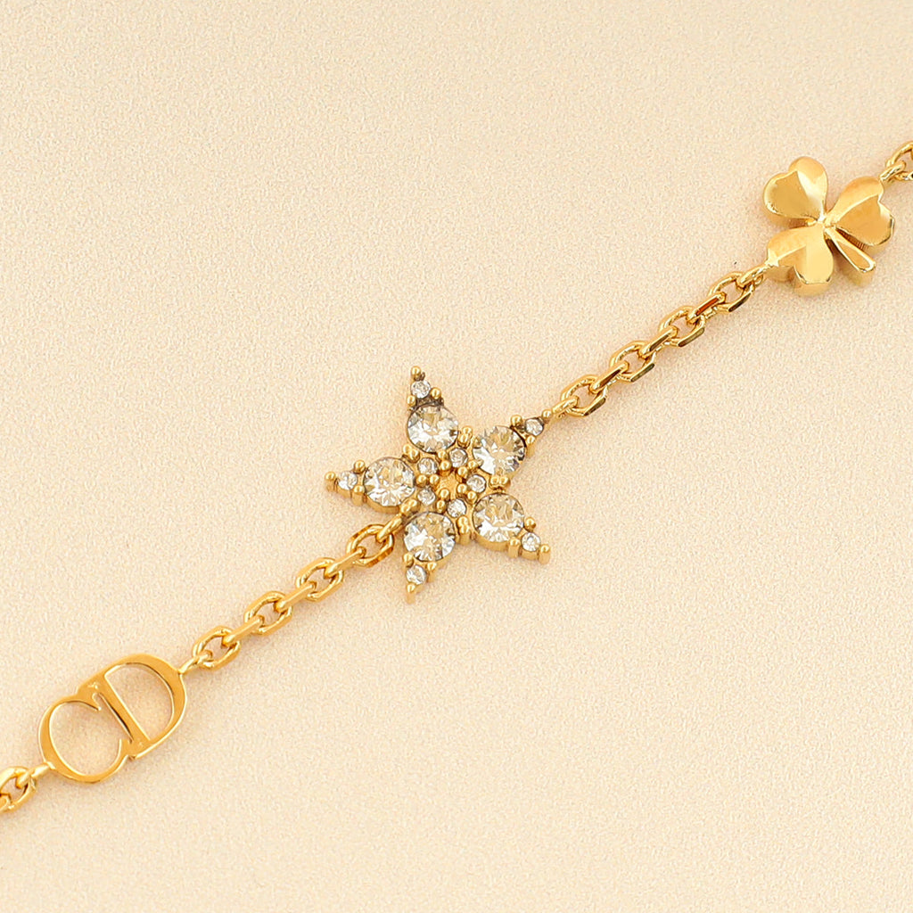 Christian Dior Gold Finish CD & Star Clair D Lune Set  Bracelet