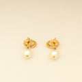 Christian Dior Gold CD Navy Earrings